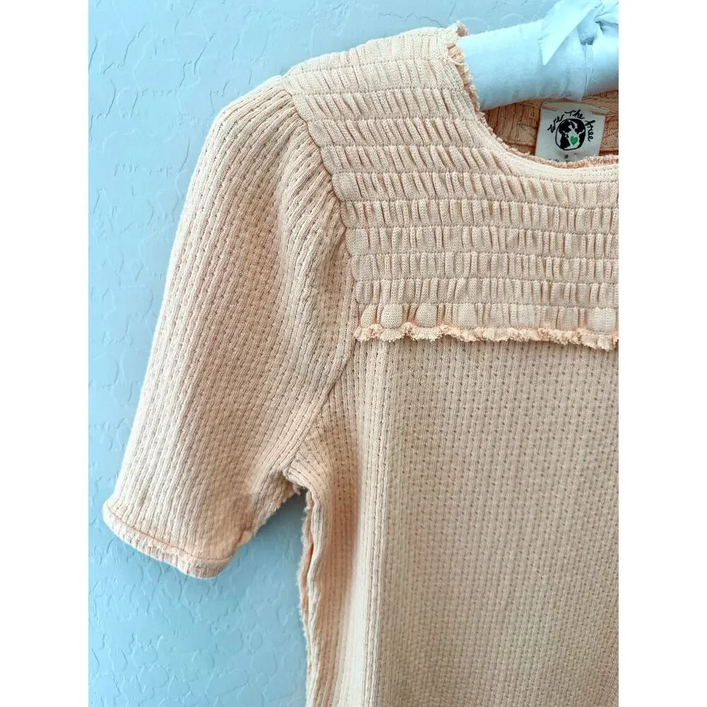 FREE PEOPLE We The Free Peach Smocked Top Short Sleeve Knit Boho Tee NWT | Small